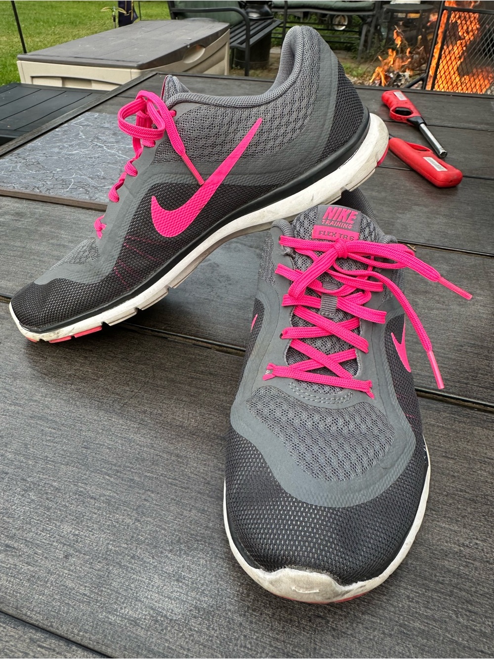 Nike Women's Gray Athletic Shoes with Pink Swoosh and Laces